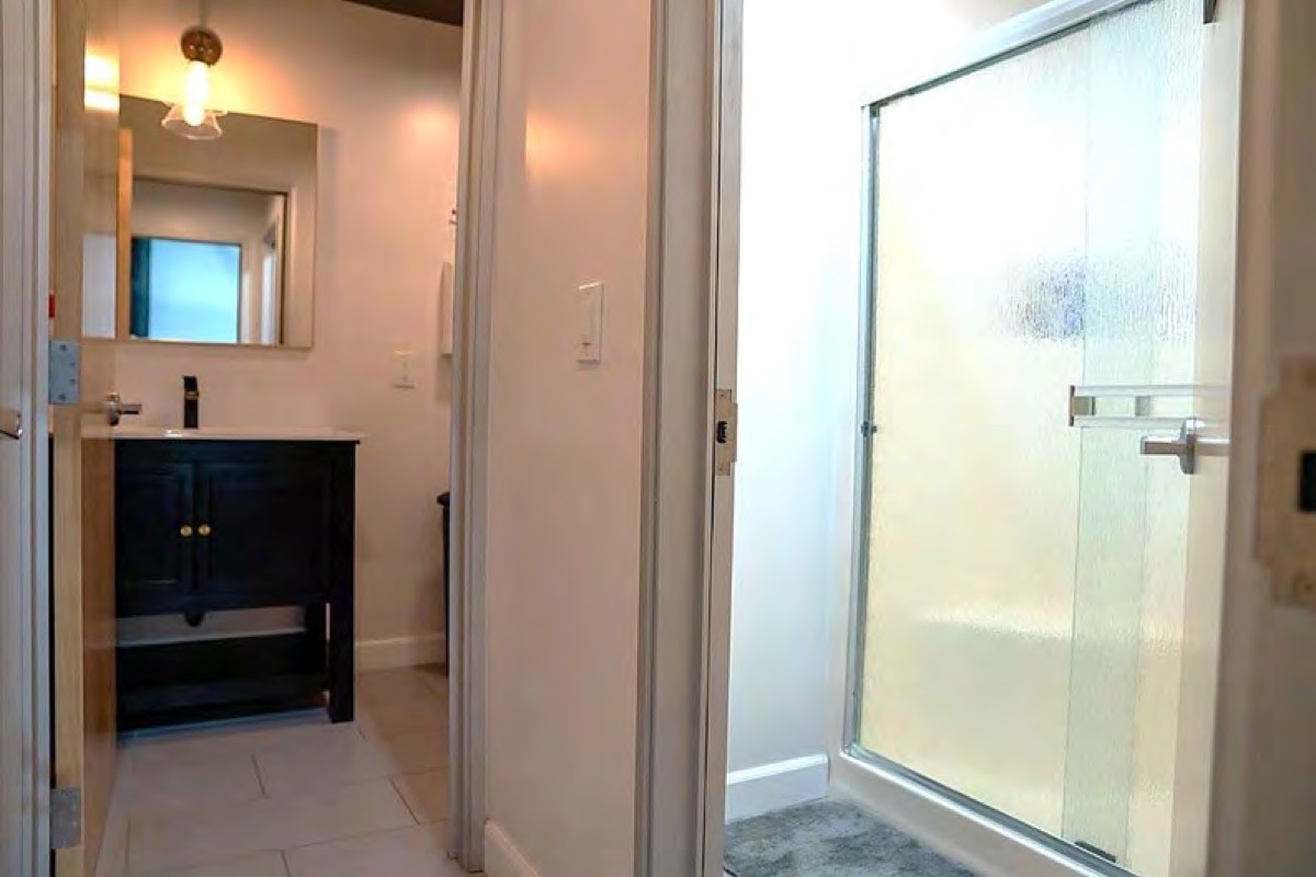 Bathroom with a glass-door shower