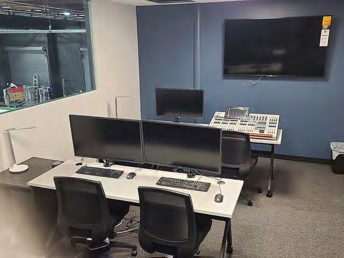 Control room workstations with dual monitors and the audio board