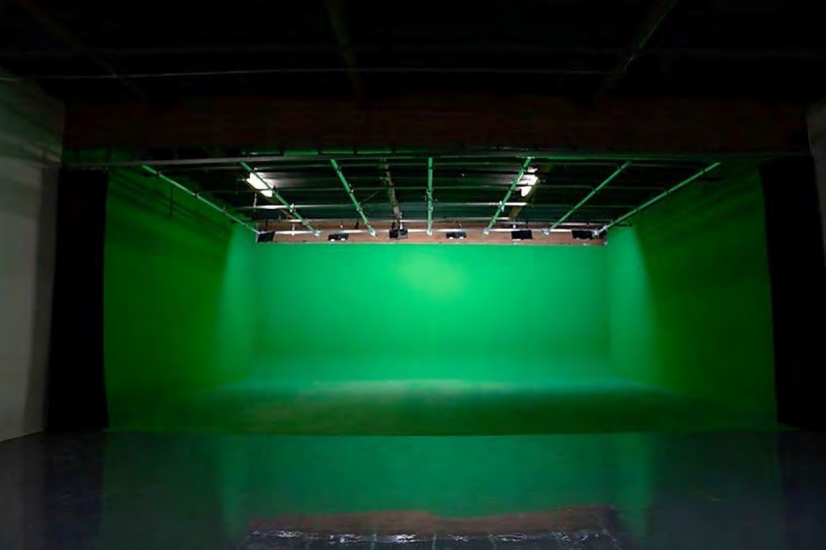 The insert stage seen from the open area, cyc lit green