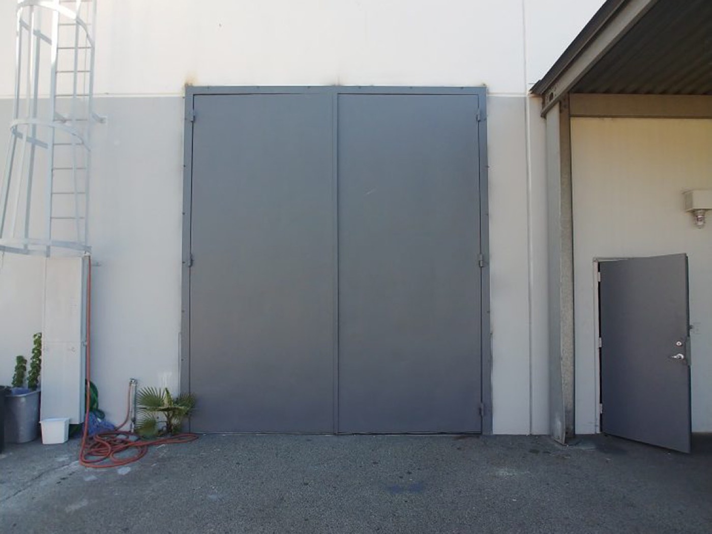 The stage's tall double elephant doors, seen from the lot